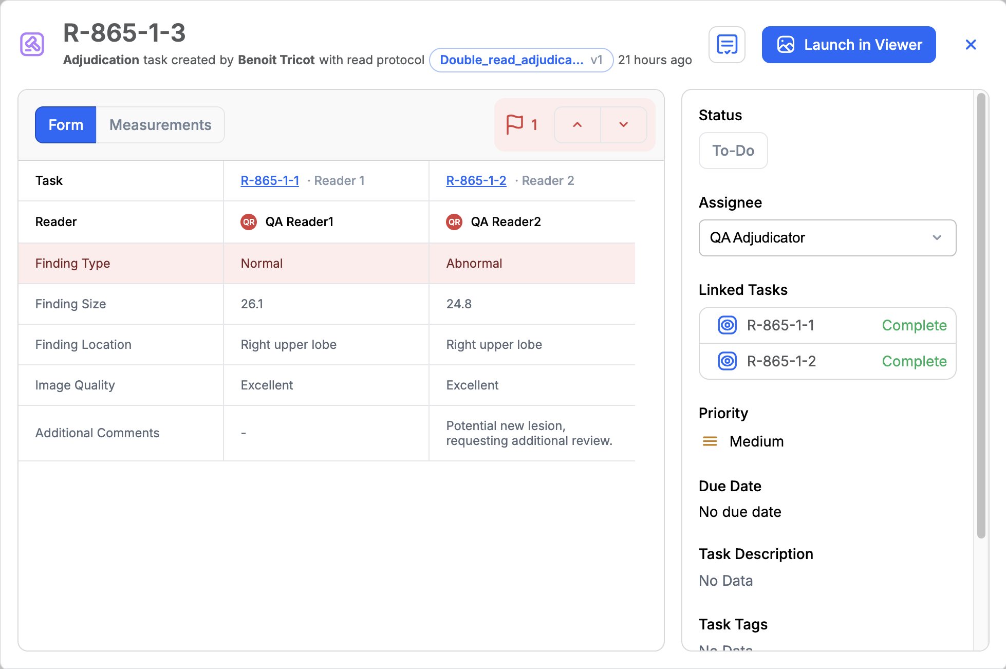 Adjudication task card form tab showing a discrepancy between the two readers' answers
